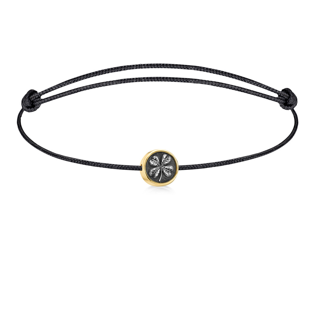 Bransoletka z charms «Koniczyna»